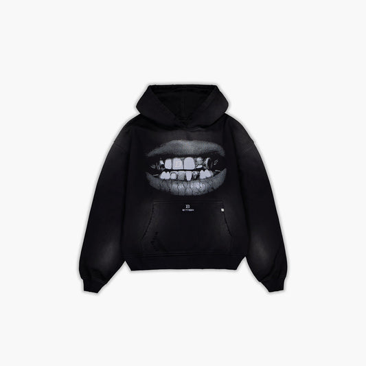 Black hoodie with a graphic of a mouth on the back against a white background